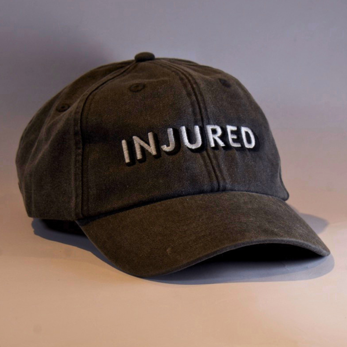 Injured | Embroidered Dad Cap